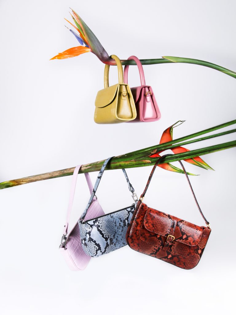 This image has an empty alt attribute; its file name is handbags-on-flower-768x1024.jpeg