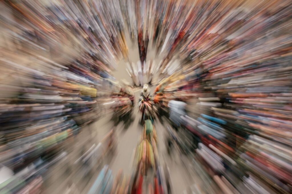 A dynamic aerial view of a bustling crowd with a zoom blur effect, showcasing movement and energy.